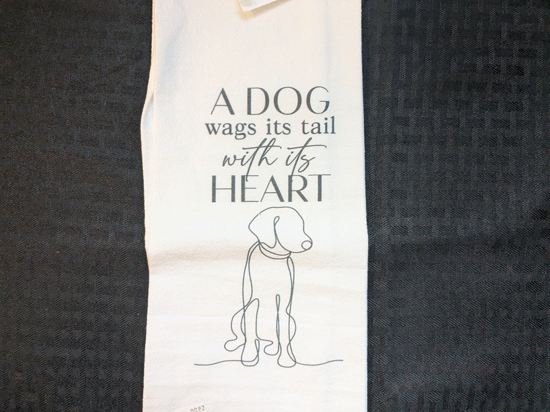dog wags its tail kitchen towel